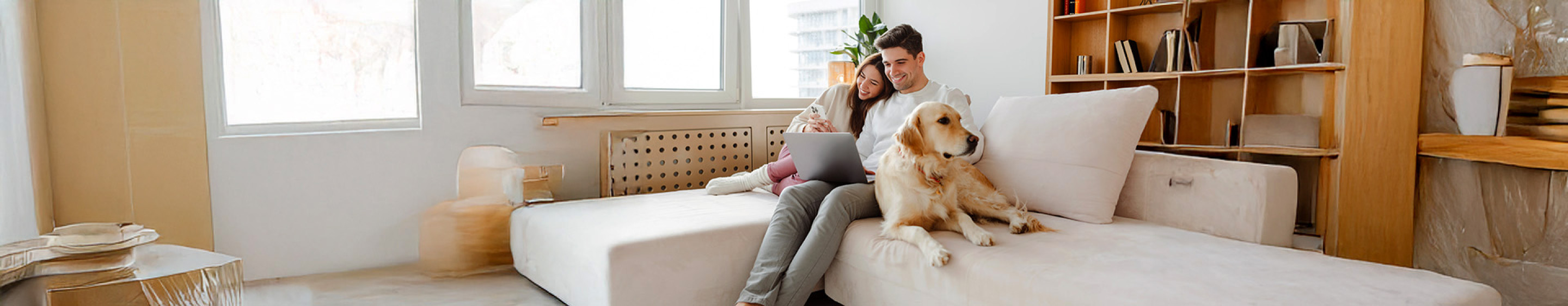 Couple and dog on sofa