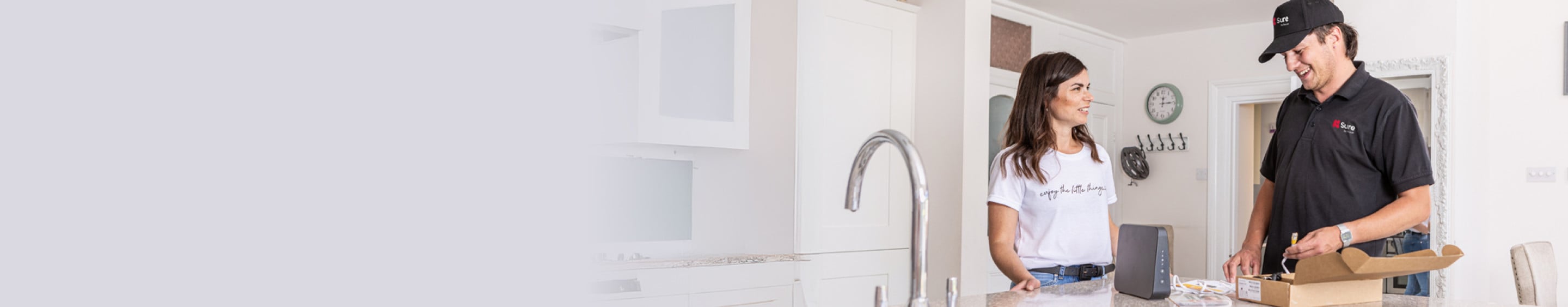 Home Tech Team visiting customer in her kitchen